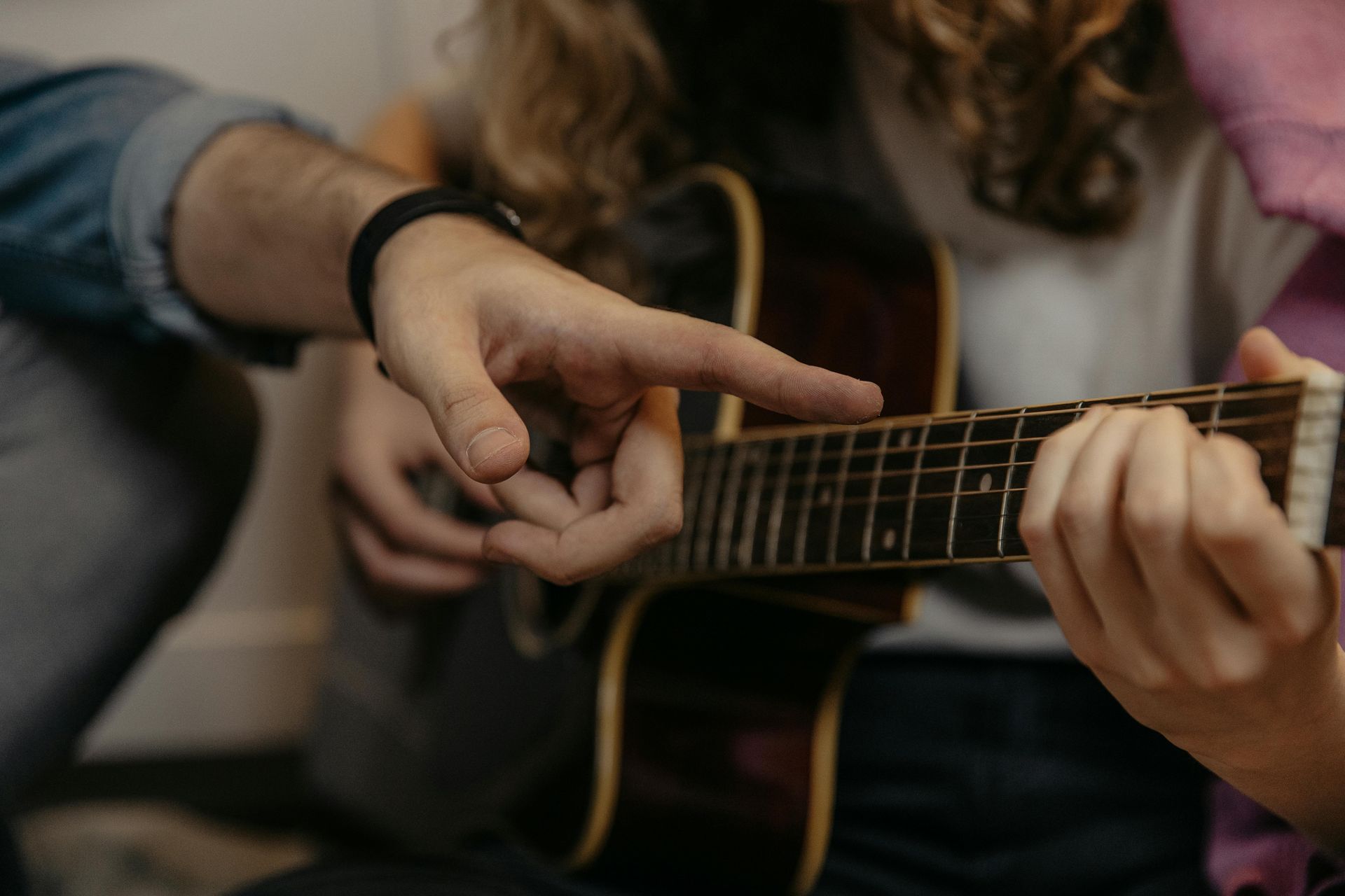 Worship guitarist playing at home